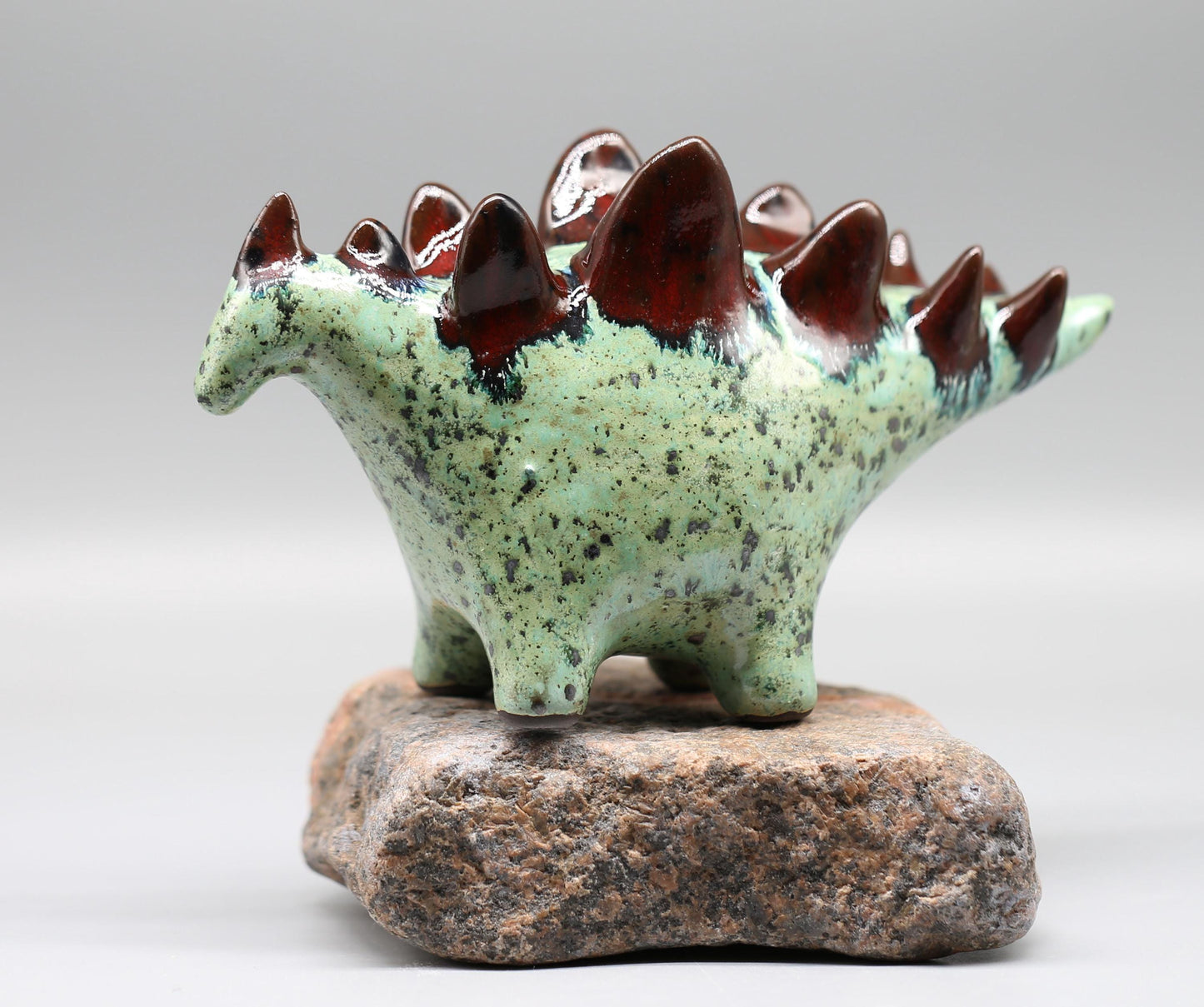 Handmade Ceramic Stegosaurus Sculpture: Mint Green - Red Art Object