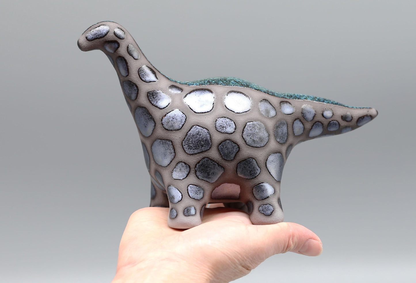 Handmade Ceramic Dinosaur Sculpture: Fantasy Table Art