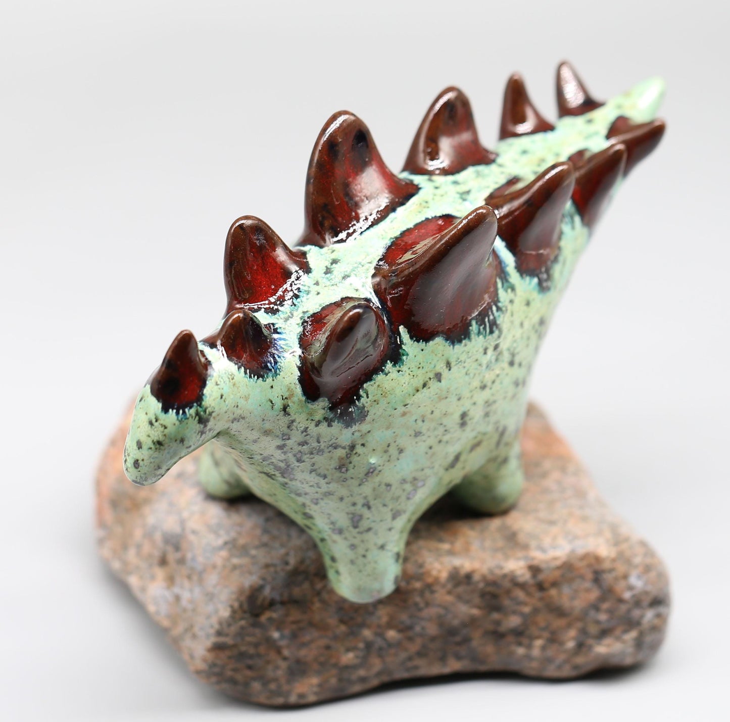 Handmade Ceramic Stegosaurus Sculpture: Mint Green -  Red Art Object