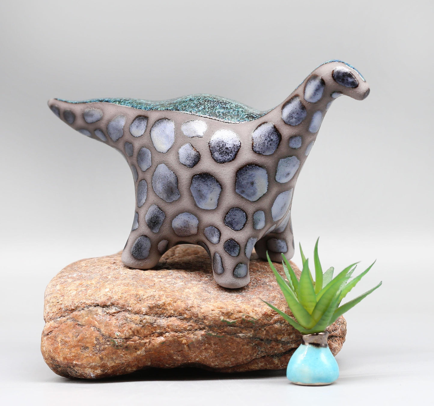 Handmade Ceramic Dinosaur Sculpture: Fantasy Table Art