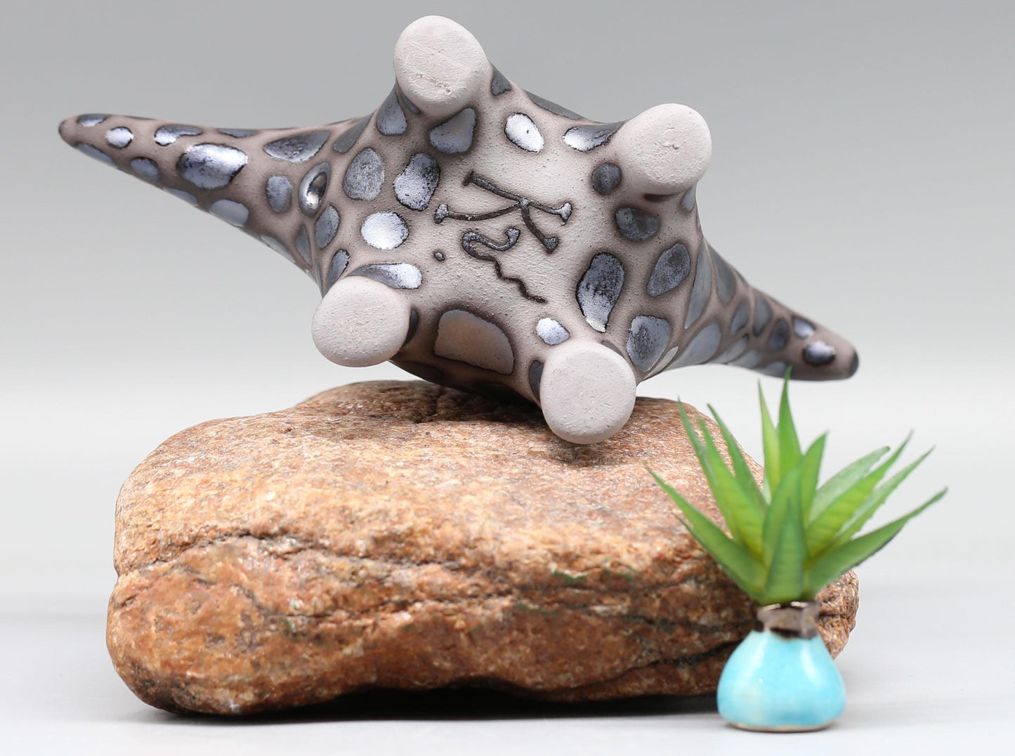 Handmade Ceramic Dinosaur Sculpture: Fantasy Table Art