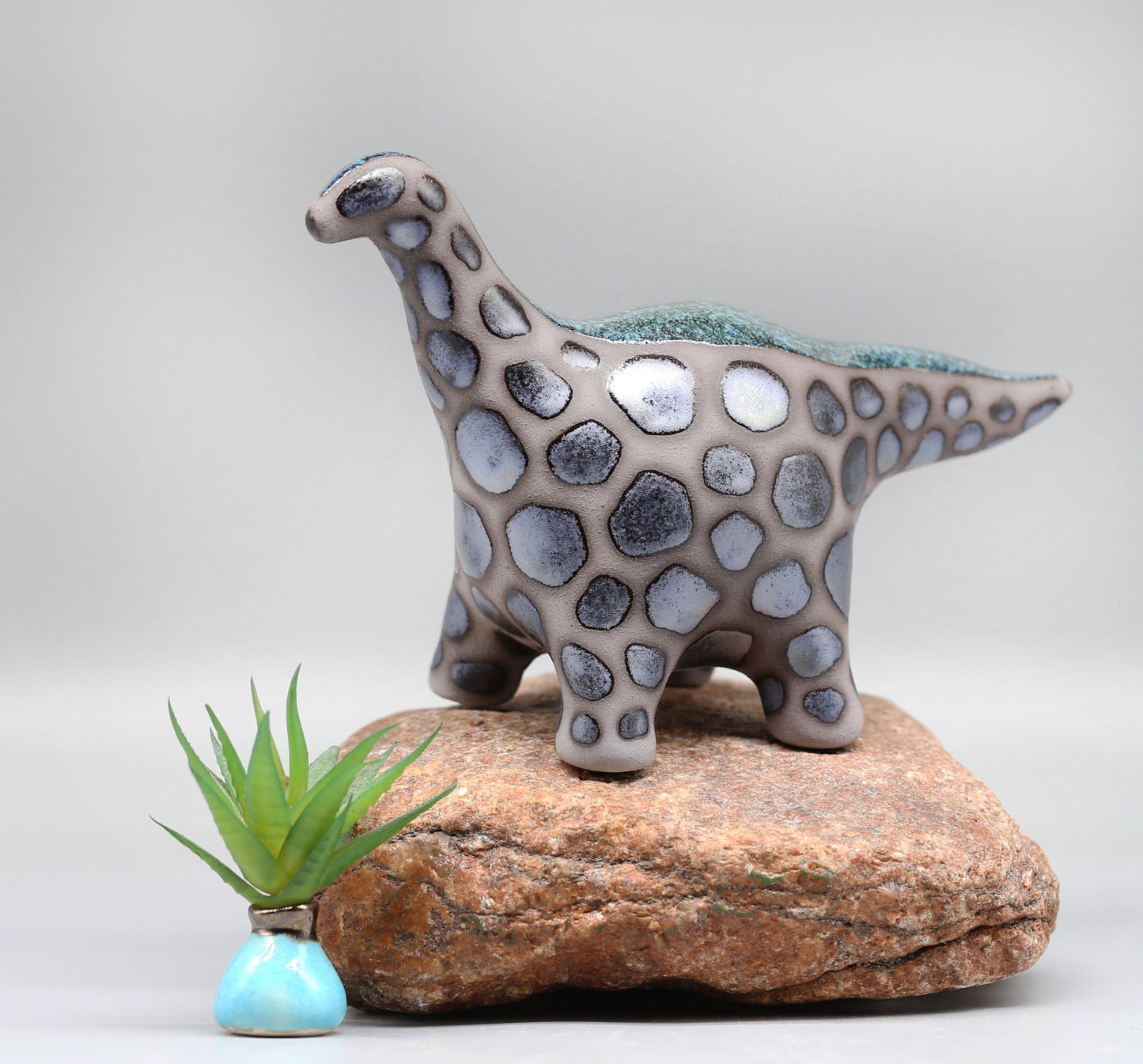 Handmade Ceramic Dinosaur Sculpture: Fantasy Table Art