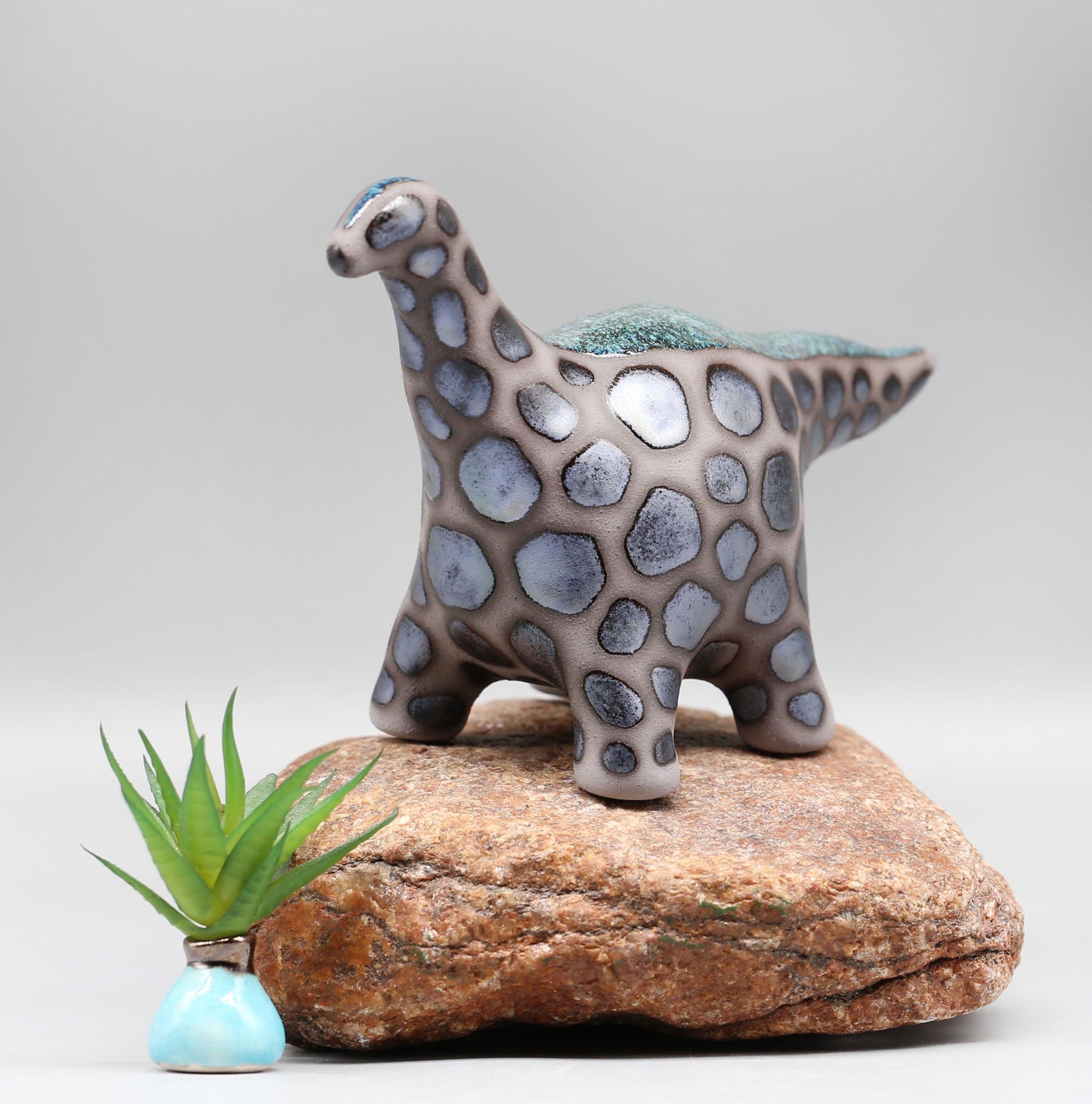 Handmade Ceramic Dinosaur Sculpture: Fantasy Table Art
