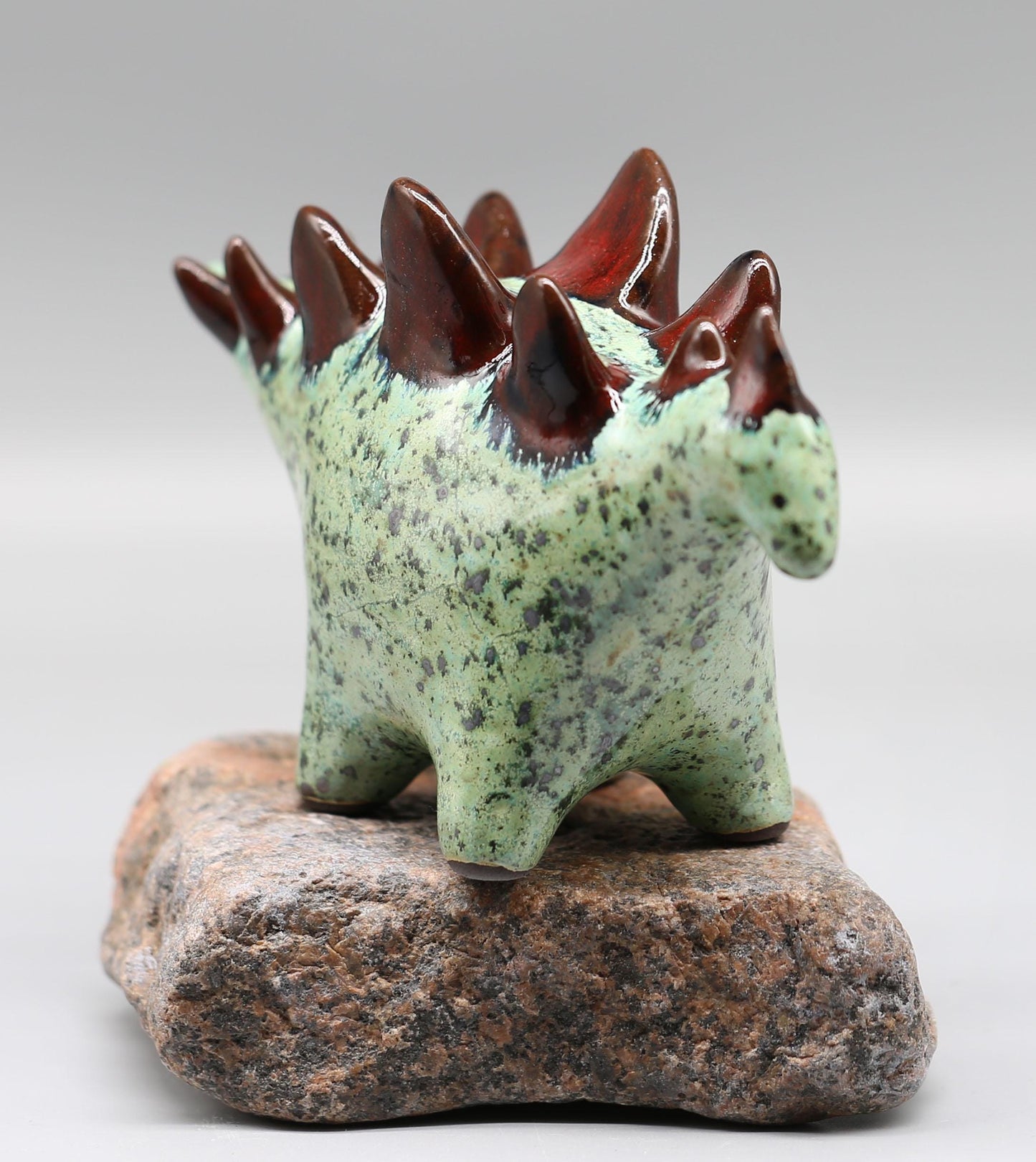Handmade Ceramic Stegosaurus Sculpture: Mint Green -  Red Art Object