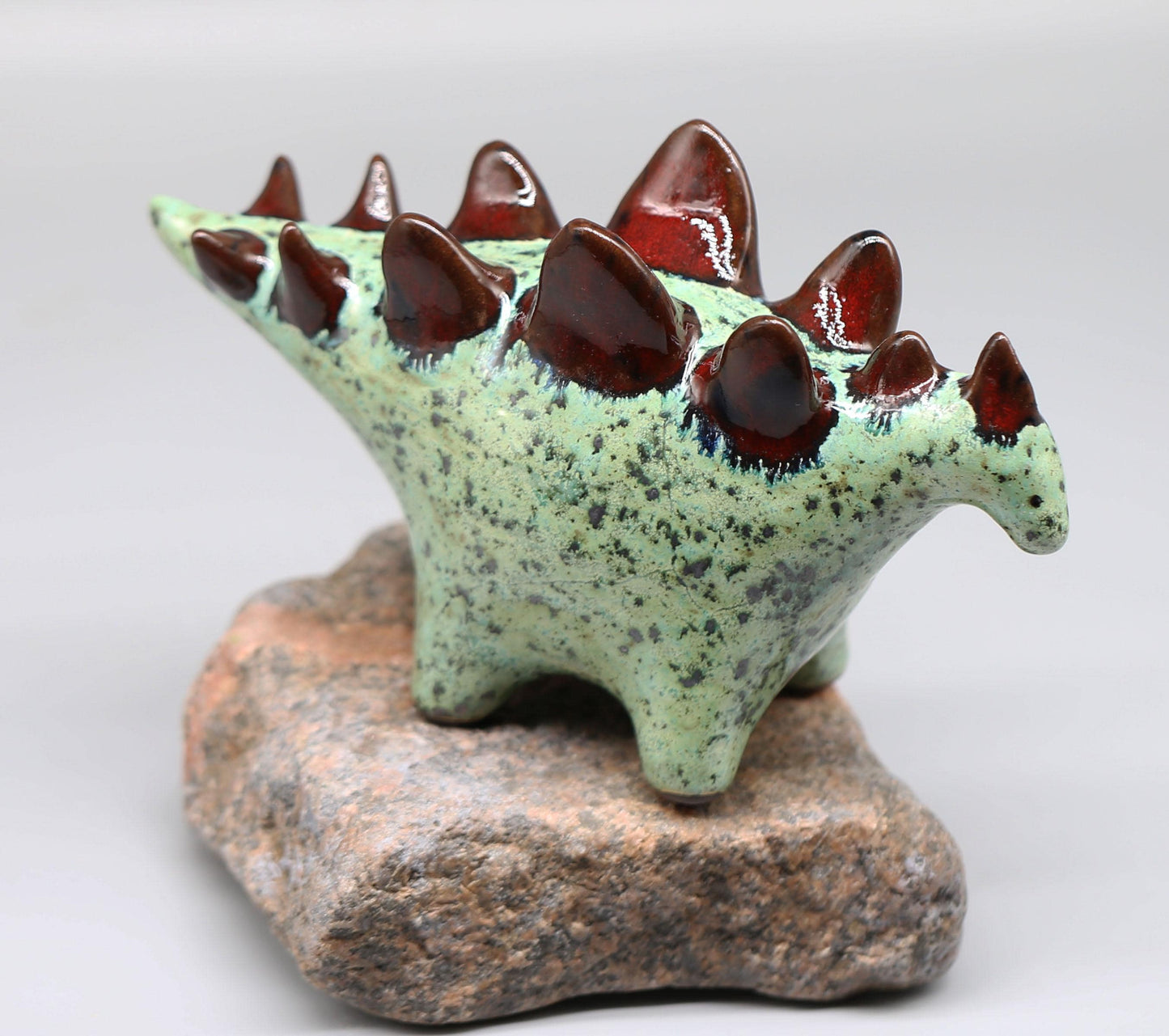 Handmade Ceramic Stegosaurus Sculpture: Mint Green -  Red Art Object