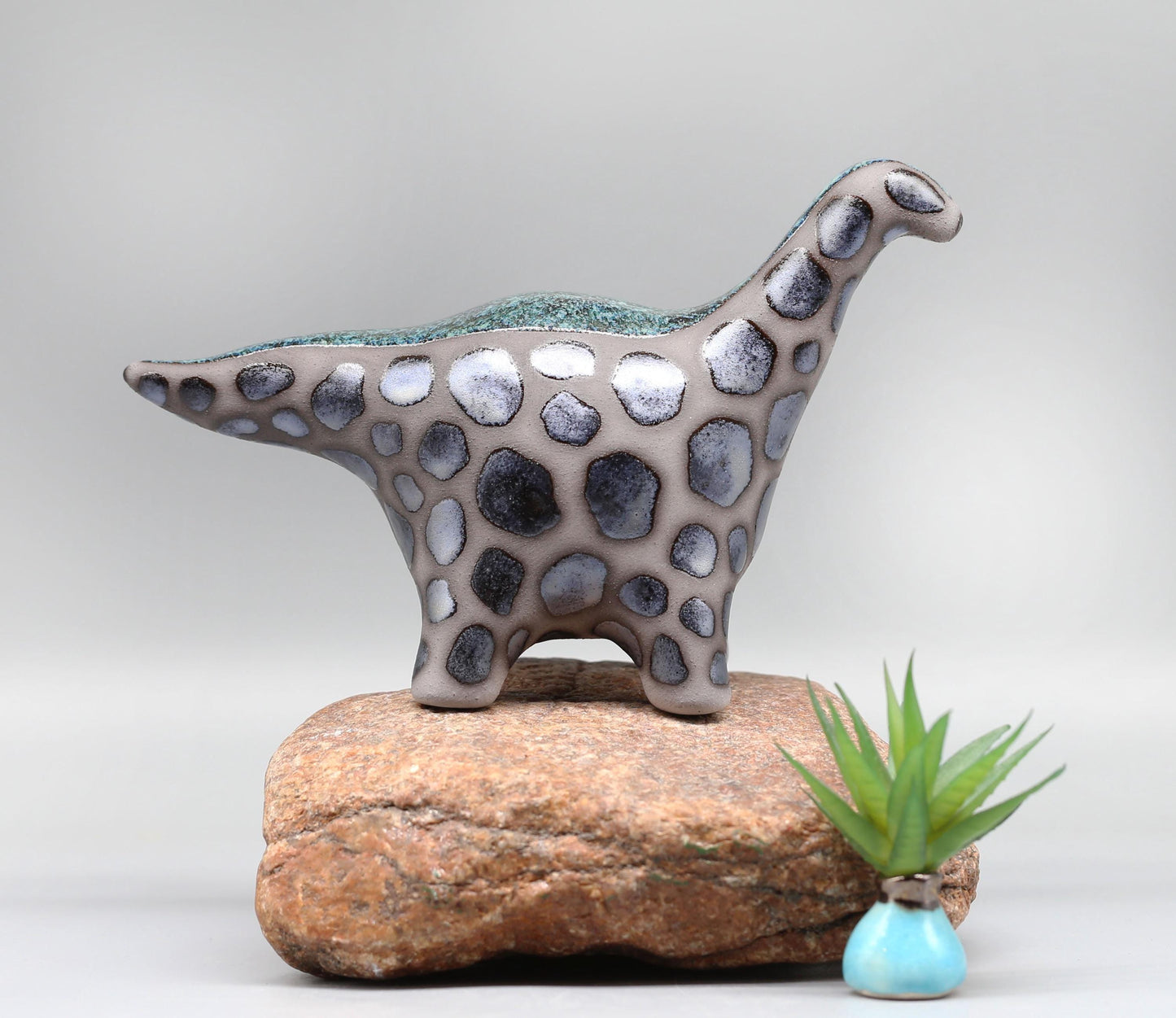 Handmade Ceramic Dinosaur Sculpture: Fantasy Table Art