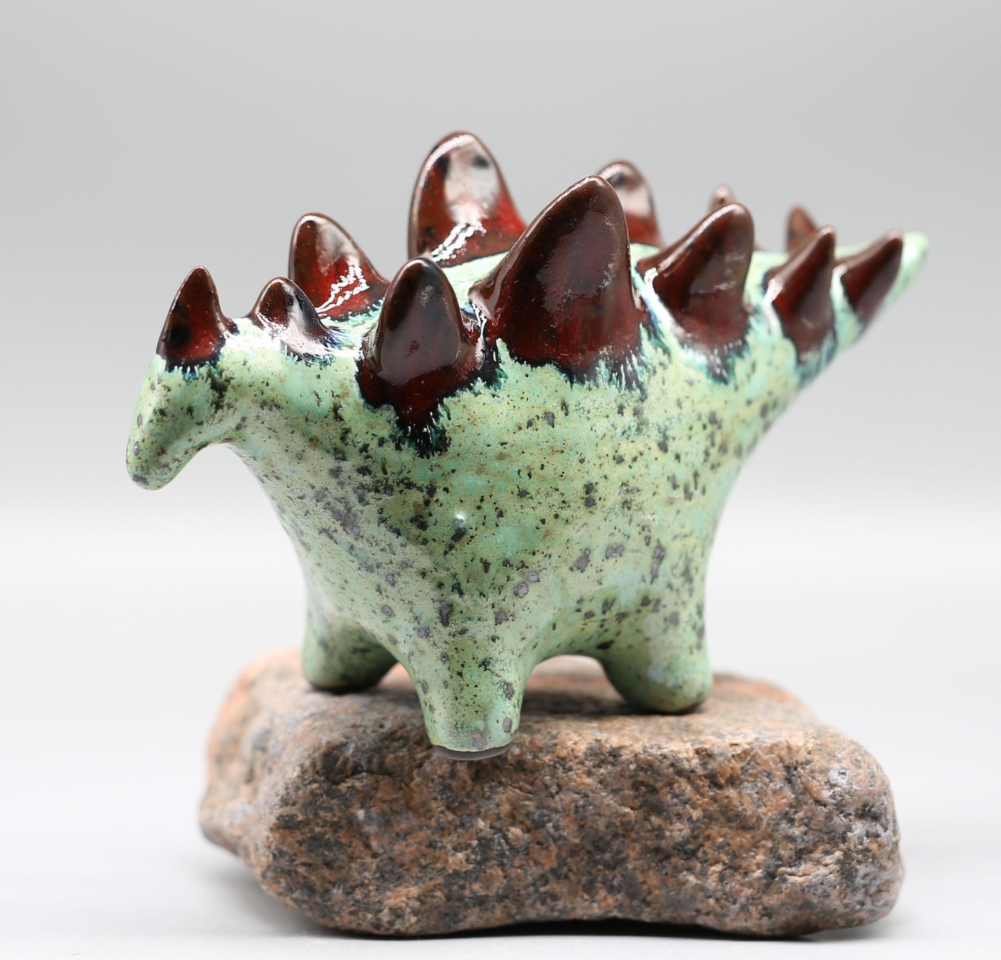 Handmade Ceramic Stegosaurus Sculpture: Mint Green -  Red Art Object