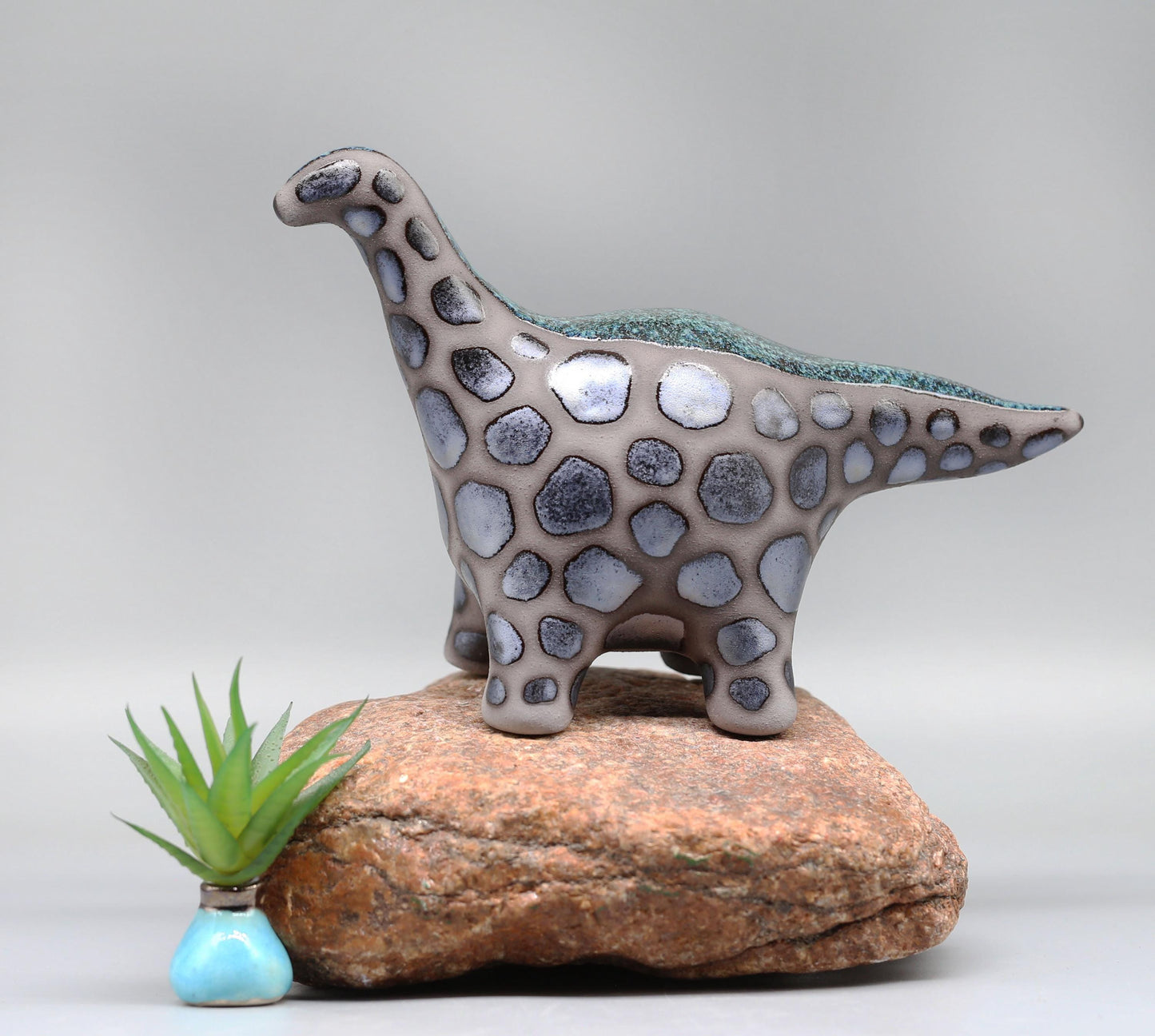 Handmade Ceramic Dinosaur Sculpture: Fantasy Table Art
